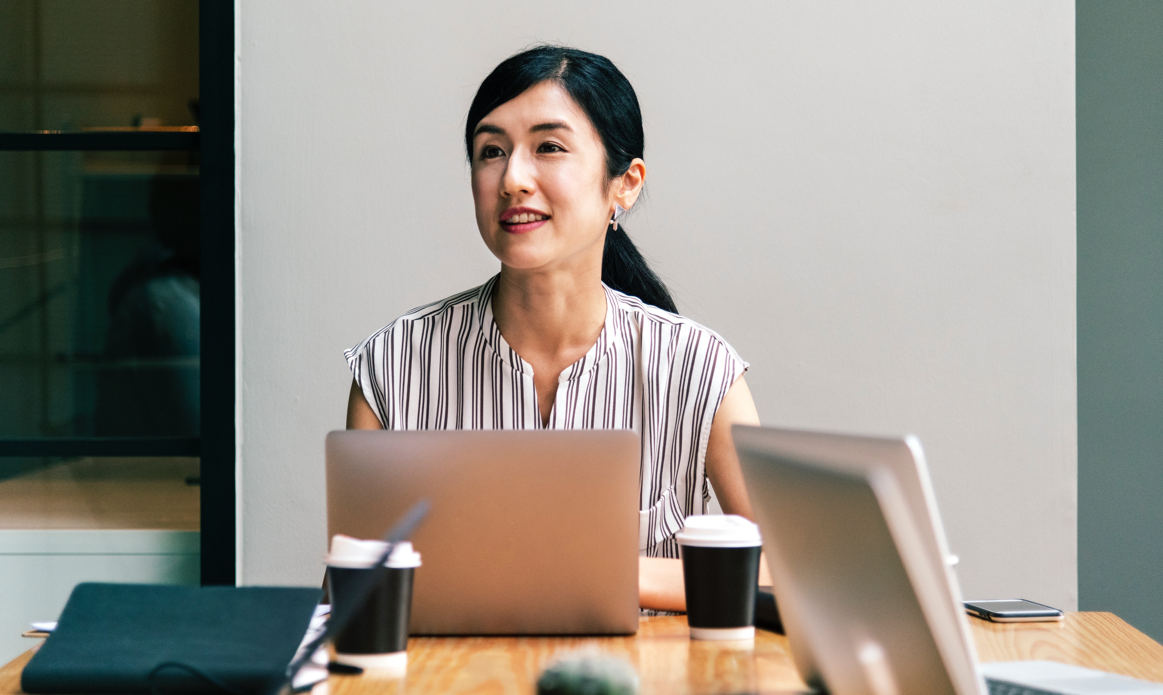 Career-Acheivers business woman with laptop