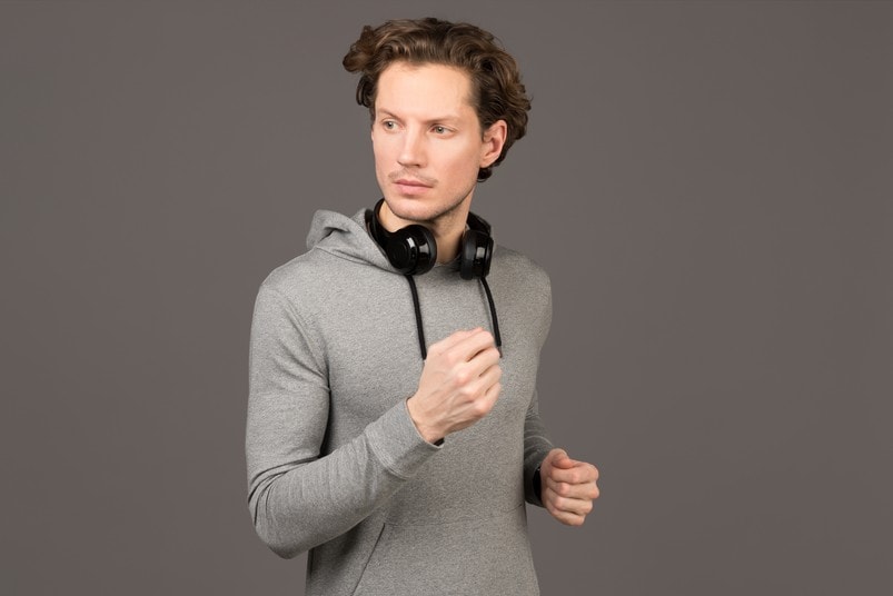 109-image-for-booklet young man grey hoodie black headphones